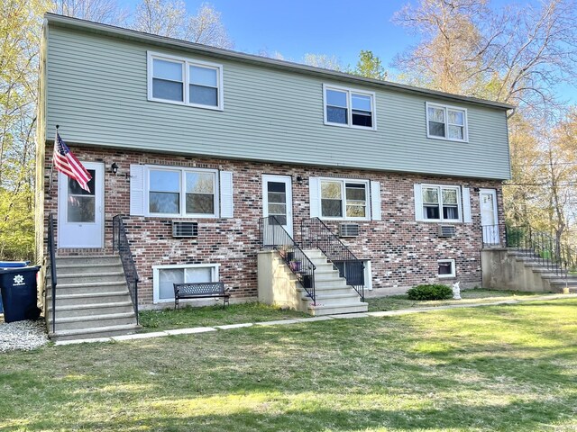 102 Caesar Dr, Bristol, CT 06010 - view of front of property featuring brick siding and a front yard