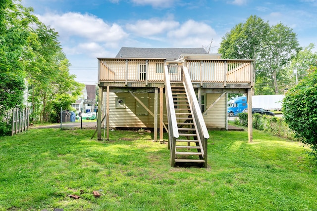 74 Mill St, Middletown, CT 06457 - rear view of house with a wooden deck, stairs, a lawn, and a shingled roof