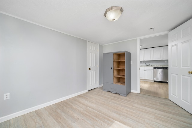 74 Mill St, Middletown, CT 06457 - unfurnished living room with light wood-style floors, baseboards, and ornamental molding