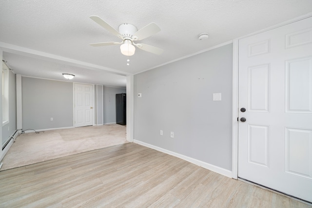 74 Mill St, Middletown, CT 06457 - unfurnished room featuring light wood finished floors, ceiling fan, a smoke detector, baseboards, and a textured ceiling