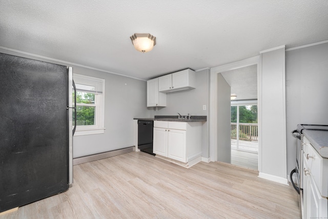74 Mill St, Middletown, CT 06457 - kitchen with freestanding refrigerator, black dishwasher, light wood-type flooring, plenty of natural light, and crown molding