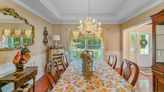 753 N Farms Rd, Wallingford, CT 06492 - dining area with a chandelier, wood finished floors, a wainscoted wall, a decorative wall, and a tray ceiling
