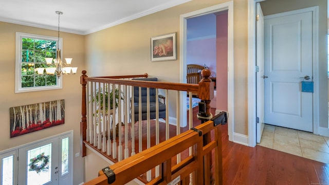753 N Farms Rd, Wallingford, CT 06492 - hall featuring a chandelier, baseboards, an upstairs landing, wood finished floors, and ornamental molding