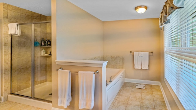 753 N Farms Rd, Wallingford, CT 06492 - bathroom with a garden tub, a stall shower, baseboards, and tile patterned flooring