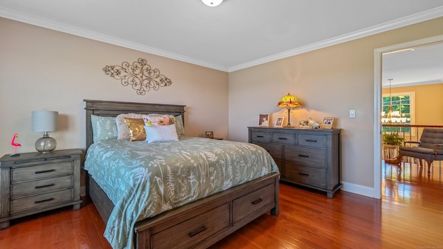 753 N Farms Rd, Wallingford, CT 06492 - bedroom with dark wood-style floors, ornamental molding, and baseboards