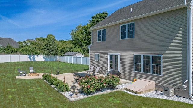 753 N Farms Rd, Wallingford, CT 06492 - rear view of property with an outdoor fire pit and a patio