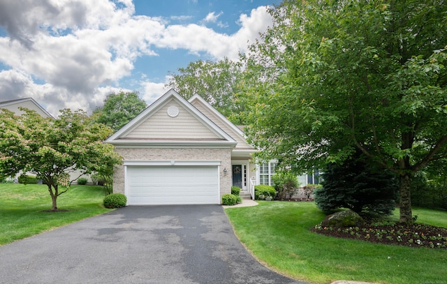 89 Links Way Unit 89, Oxford, CT 06478 - view of front facade with asphalt driveway, a front lawn, brick siding, and an attached garage