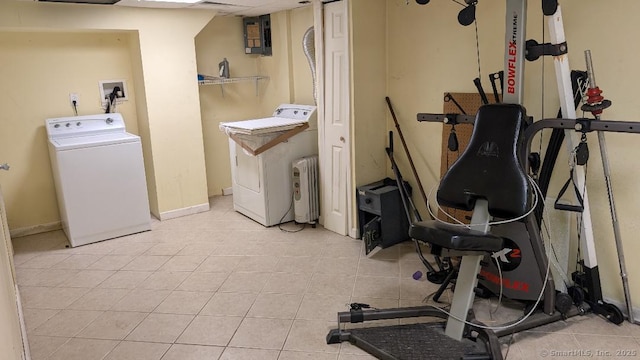 70 Lantern Park Dr Unit 1, Naugatuck, CT 06770 - laundry area featuring washer / dryer, radiator heating unit, tile patterned floors, and baseboards