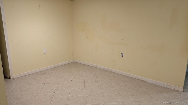 70 Lantern Park Dr Unit 1, Naugatuck, CT 06770 - spare room featuring baseboards and light tile patterned floors