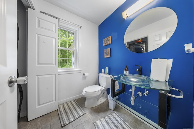 108 Hamburg Rd, Lyme, CT 06371 - bathroom featuring a sink, toilet, and baseboards