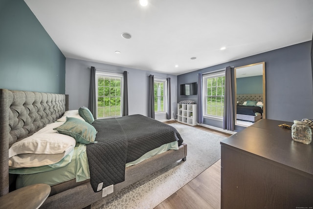 108 Hamburg Rd, Lyme, CT 06371 - bedroom featuring multiple windows, wood finished floors, and recessed lighting