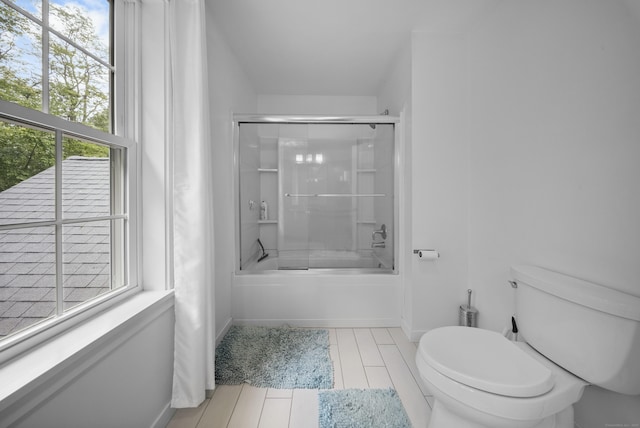 108 Hamburg Rd, Lyme, CT 06371 - full bathroom with bath / shower combo with glass door, toilet, and baseboards