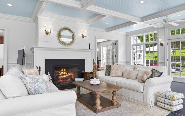 354 Rte 7 N, Canaan, CT 06031 - living area with crown molding, coffered ceiling, a lit fireplace, beam ceiling, and ceiling fan
