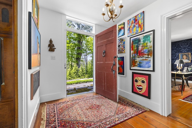 354 Rte 7 N, Canaan, CT 06031 - entryway with a chandelier, hardwood / wood-style flooring, and baseboards