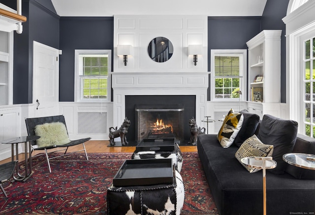 354 Rte 7 N, Canaan, CT 06031 - living area with wood finished floors, plenty of natural light, and crown molding