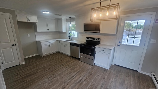 3 Norwood Ave, New London, CT 06320 - kitchen with stainless steel appliances, a sink, white cabinets, crown molding, and backsplash