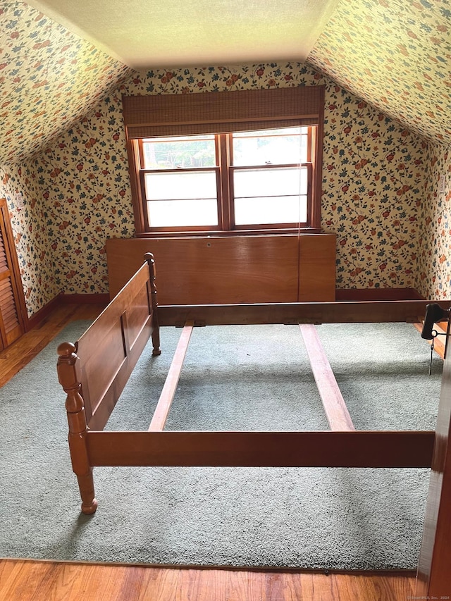 47 Devaux Rd, Torrington, CT 06790 - bonus room featuring vaulted ceiling, wallpapered walls, and wood finished floors