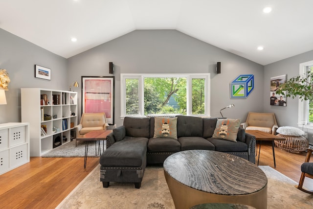 75 Skyview Dr, Trumbull, CT 06611 - living area with wood finished floors, vaulted ceiling, and recessed lighting
