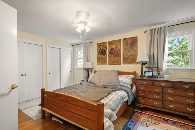 75 Skyview Dr, Trumbull, CT 06611 - bedroom featuring multiple closets and wood finished floors