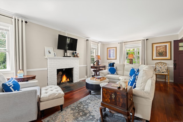 33 Crestview Dr, Brookfield, CT 06804 - living room featuring wood finished floors, a brick fireplace, and ornamental molding