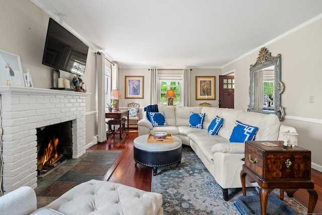 33 Crestview Dr, Brookfield, CT 06804 - living area with wood finished floors, a brick fireplace, ornamental molding, and baseboards