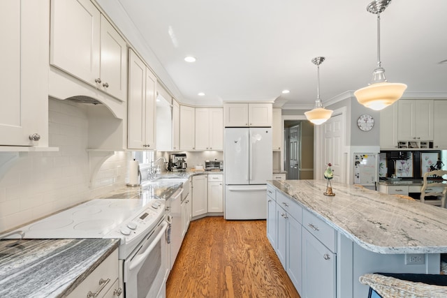 33 Crestview Dr, Brookfield, CT 06804 - kitchen with white appliances, light wood-style flooring, decorative backsplash, recessed lighting, and white cabinets