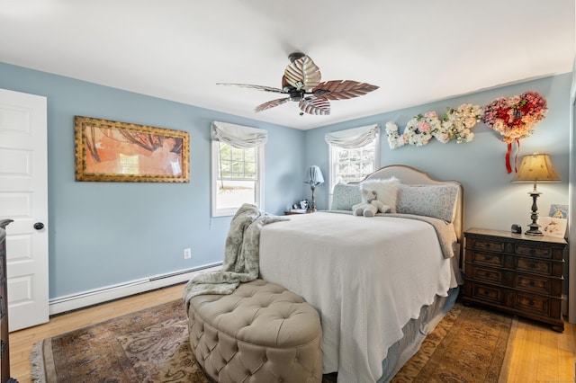 33 Crestview Dr, Brookfield, CT 06804 - bedroom with a baseboard radiator, wood finished floors, and ceiling fan