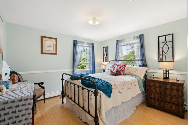 33 Crestview Dr, Brookfield, CT 06804 - bedroom with wood finished floors, a baseboard radiator, and baseboards