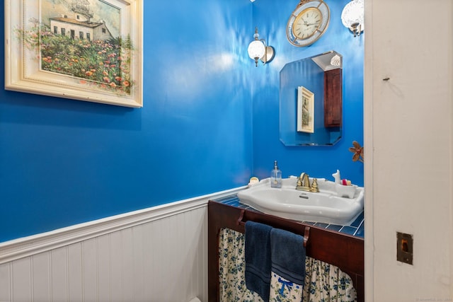 33 Crestview Dr, Brookfield, CT 06804 - half bathroom with wainscoting and vanity