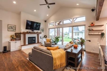 43B Saunders Hollow Rd, Old Lyme, CT 06371 - living area featuring ceiling fan, dark wood-style flooring, a glass covered fireplace, high vaulted ceiling, and recessed lighting