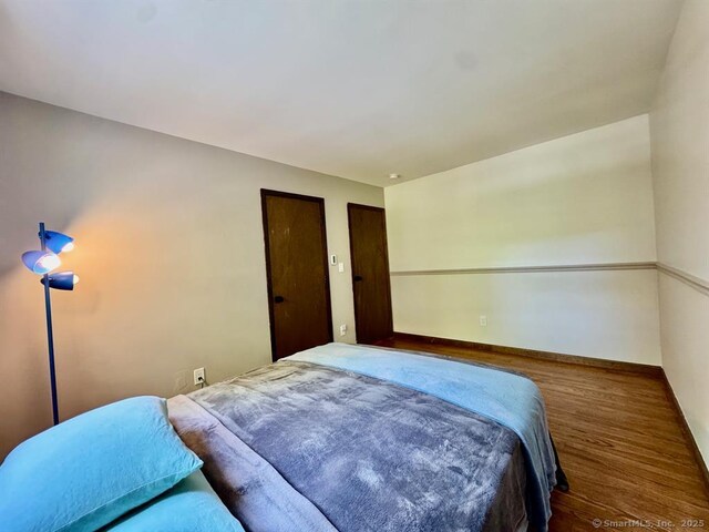687 Sprout Brook Rd, Putnam Valley, NY 10579 - bedroom with wood finished floors and baseboards
