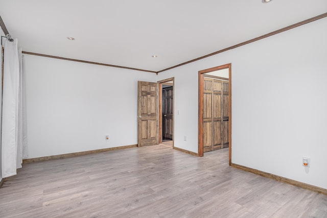 14 Old Bridge Rd W, New Fairfield, CT 06812 - spare room with crown molding, baseboards, light wood-style flooring, and recessed lighting