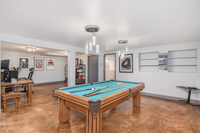 14 Old Bridge Rd W, New Fairfield, CT 06812 - playroom featuring finished concrete floors, billiards, an office area, built in shelves, and baseboards
