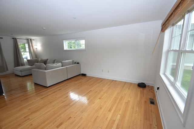 5 Old Village Cir, Windsor, CT 06095 - living room featuring light wood-type flooring, healthy amount of natural light, and baseboards