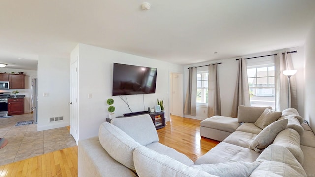 5 Old Village Cir, Windsor, CT 06095 - living room featuring light wood-style flooring and baseboards