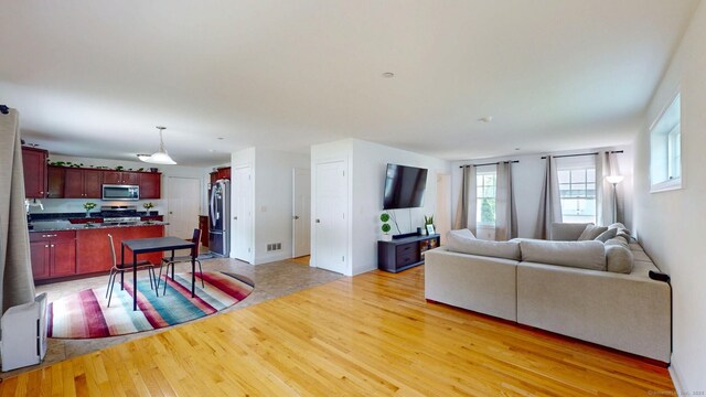 5 Old Village Cir, Windsor, CT 06095 - living area featuring light wood finished floors