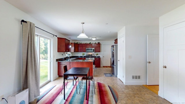 5 Old Village Cir, Windsor, CT 06095 - dining room with light tile patterned flooring and baseboards