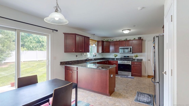 5 Old Village Cir, Windsor, CT 06095 - kitchen featuring appliances with stainless steel finishes, a sink, pendant lighting, and a peninsula
