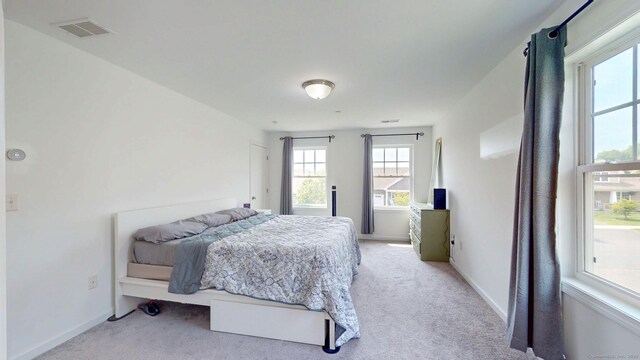 5 Old Village Cir, Windsor, CT 06095 - bedroom featuring light colored carpet and baseboards