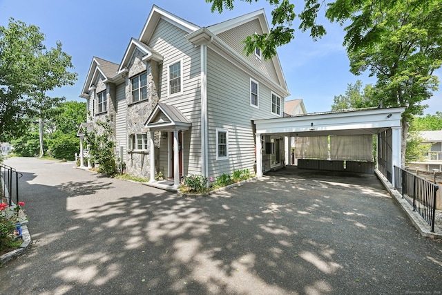 43 Harold St Unit B, Greenwich, CT 06807 - view of property exterior with asphalt driveway