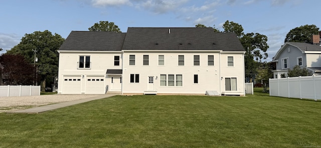 435 Maple Ave, Cheshire, CT 06410 - back of house featuring an attached garage and driveway