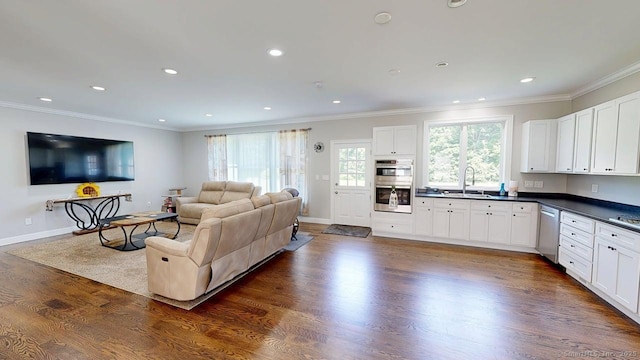 435 Maple Ave, Cheshire, CT 06410 - living room featuring crown molding, dark wood finished floors, and recessed lighting