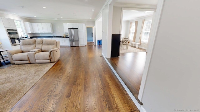 435 Maple Ave, Cheshire, CT 06410 - living area featuring ornamental molding, dark wood-style floors, and recessed lighting