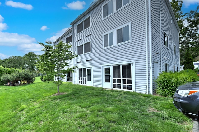 267 Melba St Apt D2, Milford, CT 06460 - back of house featuring a lawn