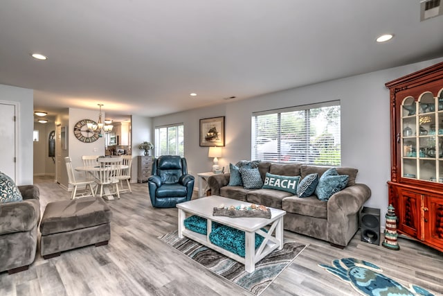 267 Melba St Apt D2, Milford, CT 06460 - living room with a chandelier, wood finished floors, and recessed lighting