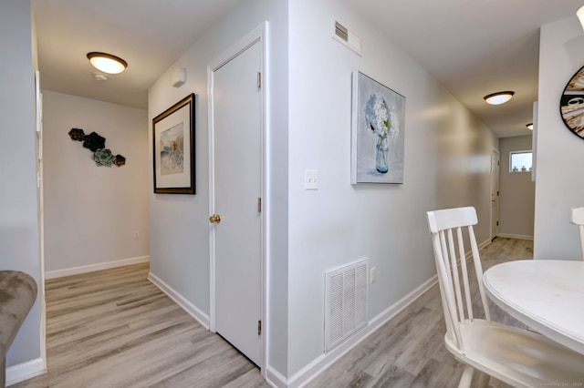 267 Melba St Apt D2, Milford, CT 06460 - corridor featuring light wood-type flooring and baseboards