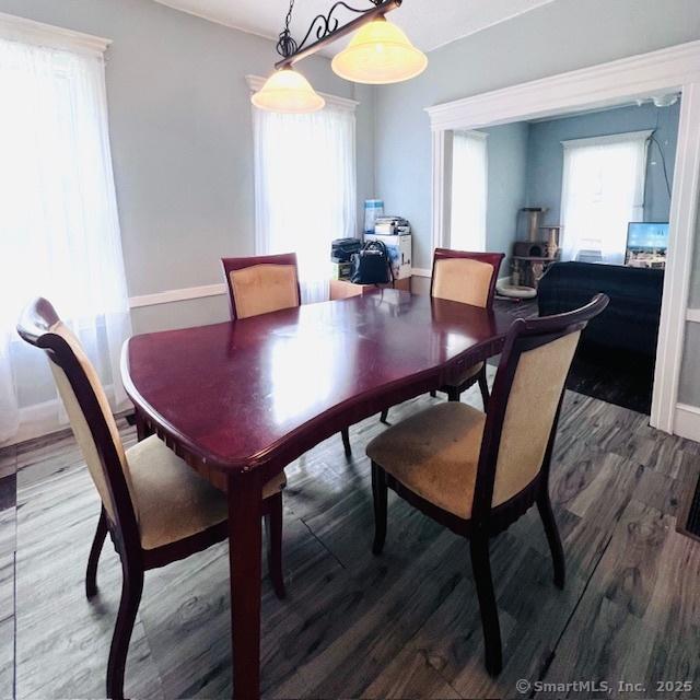 22 Webb St, Hamden, CT 06517 - dining area featuring wood finished floors and baseboards