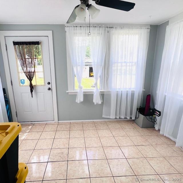 22 Webb St, Hamden, CT 06517 - dining room with a ceiling fan, healthy amount of natural light, and light tile patterned floors