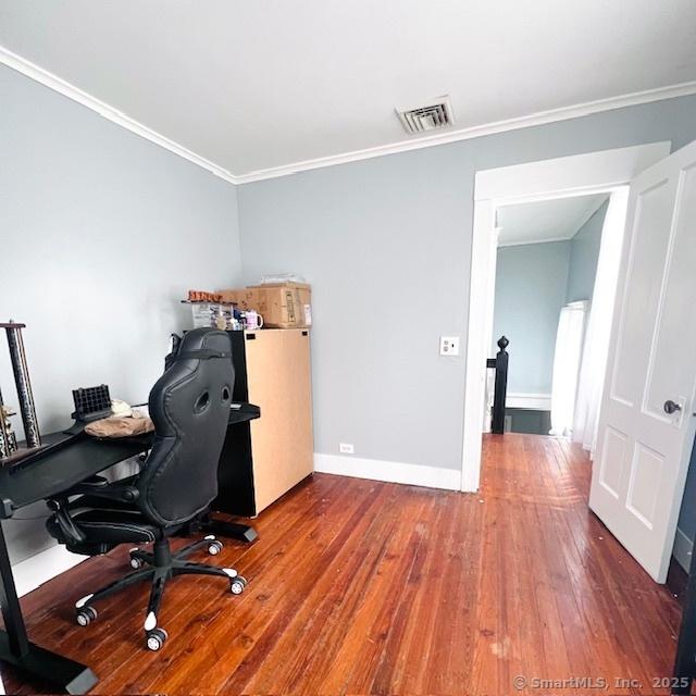 22 Webb St, Hamden, CT 06517 - home office with hardwood / wood-style floors, crown molding, and baseboards