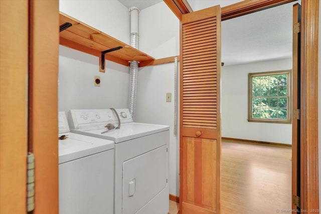 10 Crown Rdg Unit 10, Newington, CT 06111 - washroom featuring light wood-type flooring, independent washer and dryer, and baseboards
